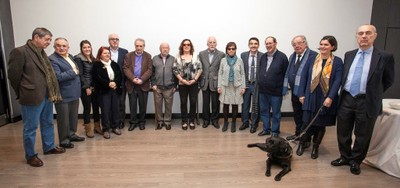Foto de familia de los jurados con los responsables de la ONCE