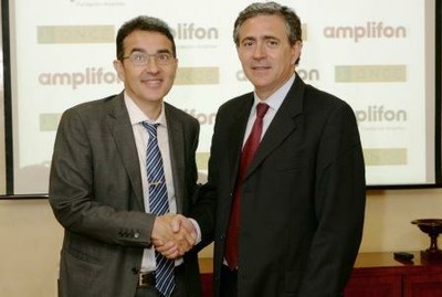 Andrés Ramos (a la izquierda) estrecha la mano de Obdulio Herrera