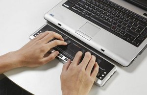 Línea braille y portátil