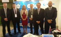 Directivos de ILUNION en su estand en la Feria