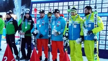 Santacana y Galindo en el podio, recogiendo el bronce en la prueba del eslalon gigante