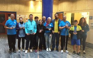 Foto de familia de los galardonados en Málaga con los responsables de la Organización