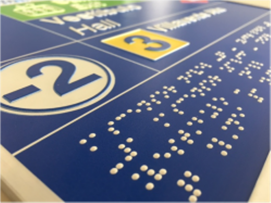 Nuevo cartel en braille y en relieve de Metro de Madrid