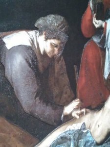 Detalle del rellieve de San Sebastián curando a las mujeres