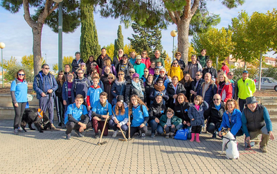 El grupo de afiliados y voluntarios posa conjuntamente tras llevar a cabo la plantación