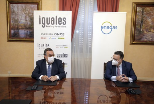 Carballeda y Llardén tras la firna del acuerdo