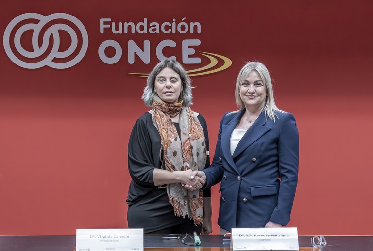 Carcedo y Herce tras la firma del acuerdo