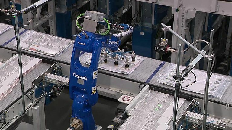 Otra vista del proceso robotizado de producción y empaquetado de cupones